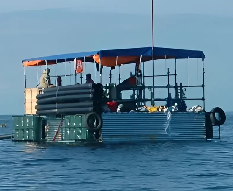 Makeshift raft with canopy on water