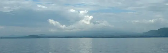 Vast lake panorama under serene sky