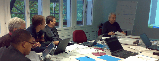 Business meeting with laptops and projector