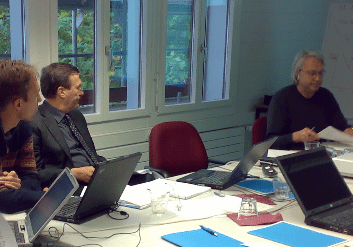Business meeting with laptops and projector